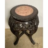 A small Oriental wooden hand-carved marble-topped plant stand/jardiniere with carved plants/flowers