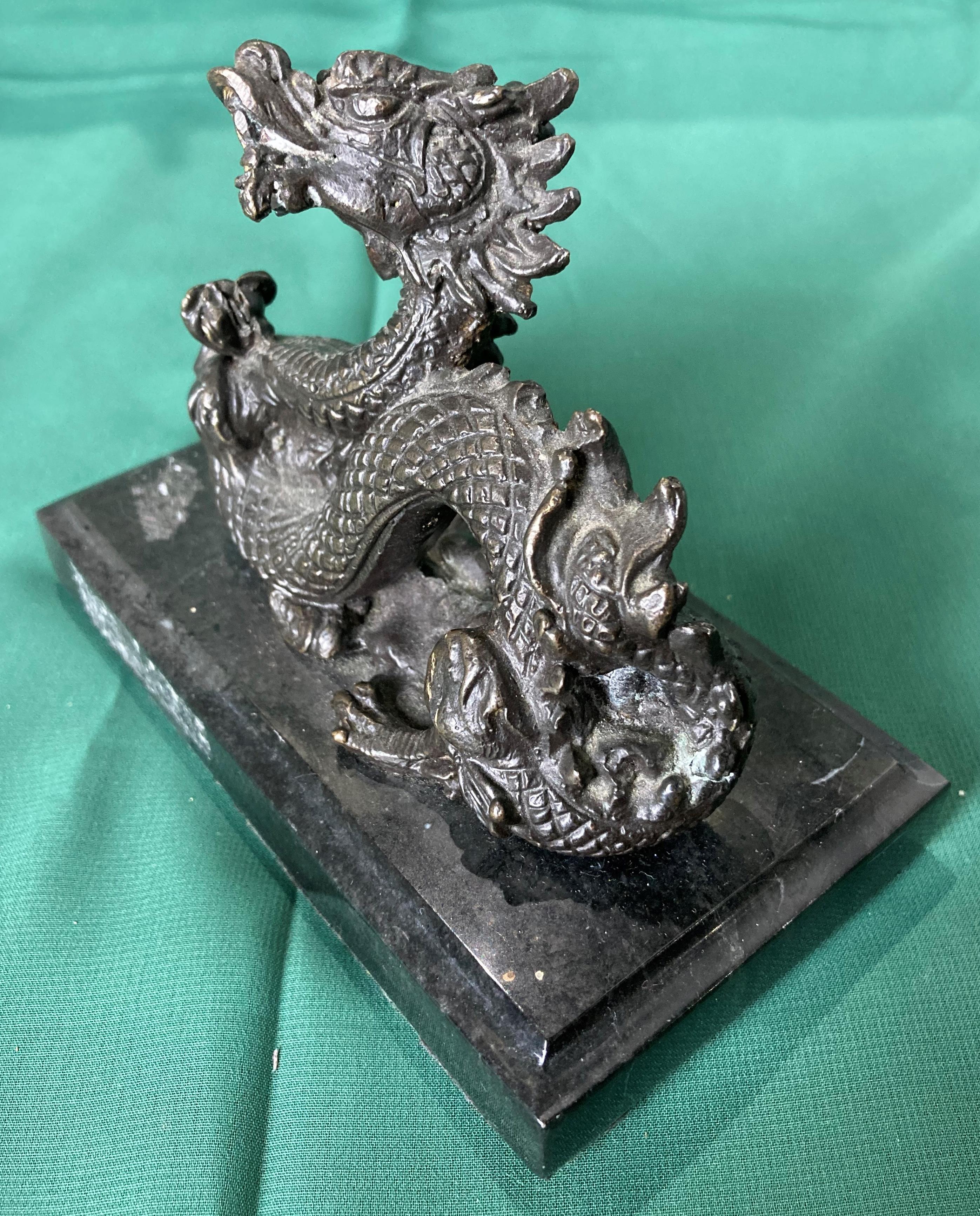 Bronze dragon sculpture on black marble base, 10cm high x 13. - Image 3 of 4