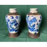 Pair of blue and white Nanking vases decorated with dragons and flowers with stamp to underside,