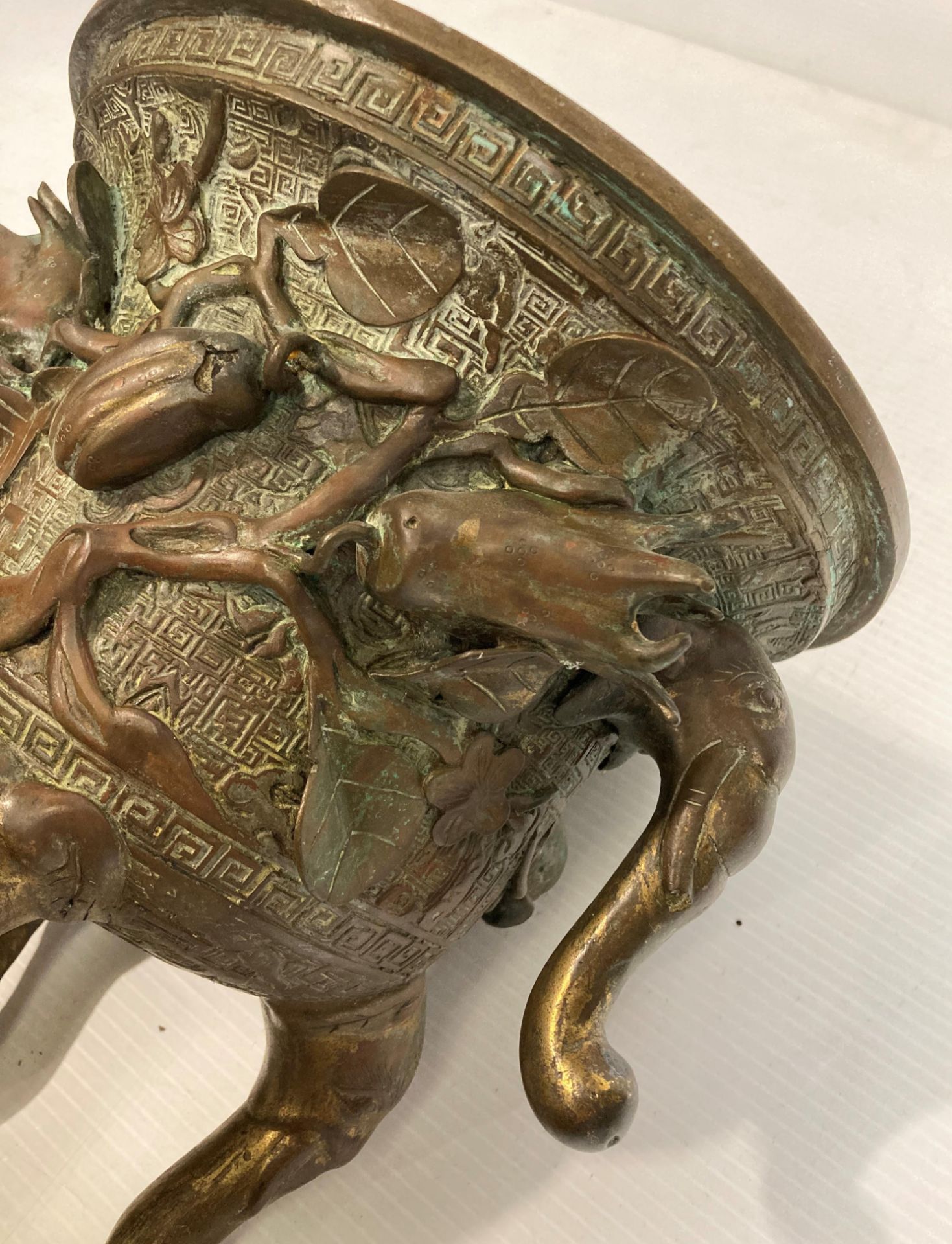 An Oriental bronze incense burner with elephant head legs and two elephant head handles with - Image 2 of 21