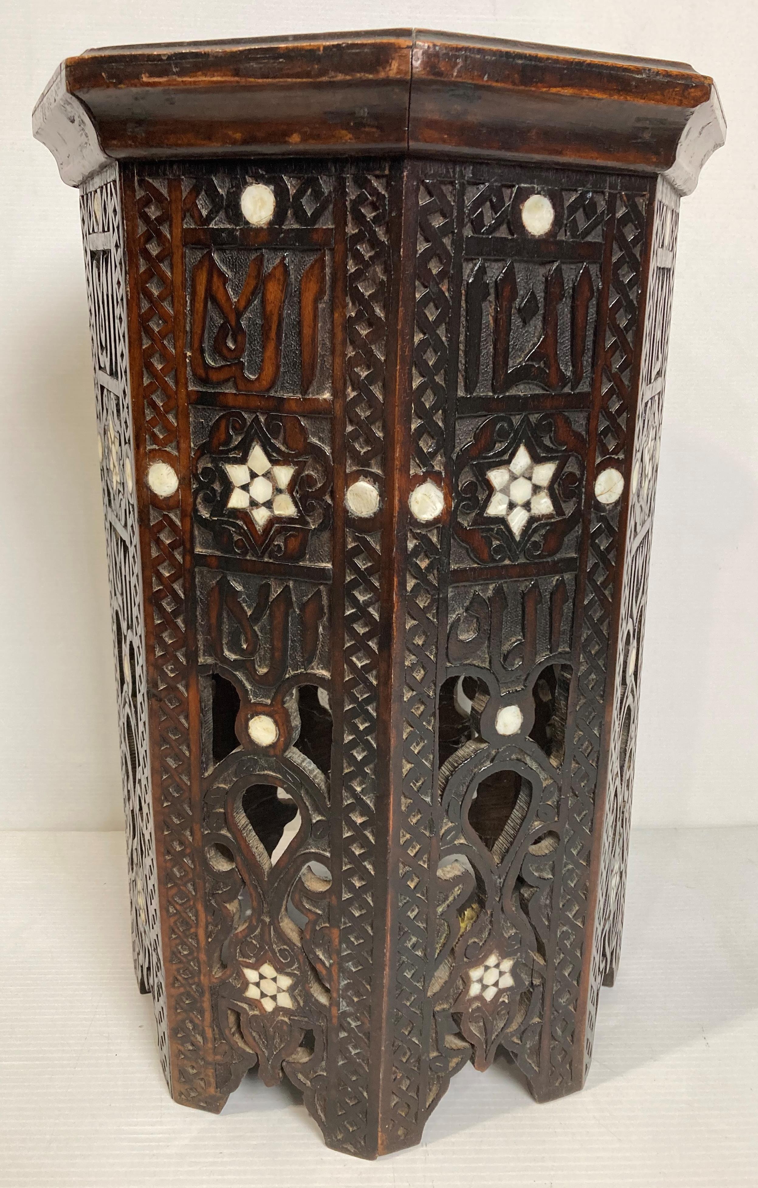 A hand-carved wooden Moorish eastern octagonal side table with mother of pearl inlay, - Image 4 of 6