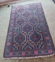 A blue and red patterned oriental rug,