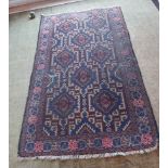 A blue and red patterned oriental rug,