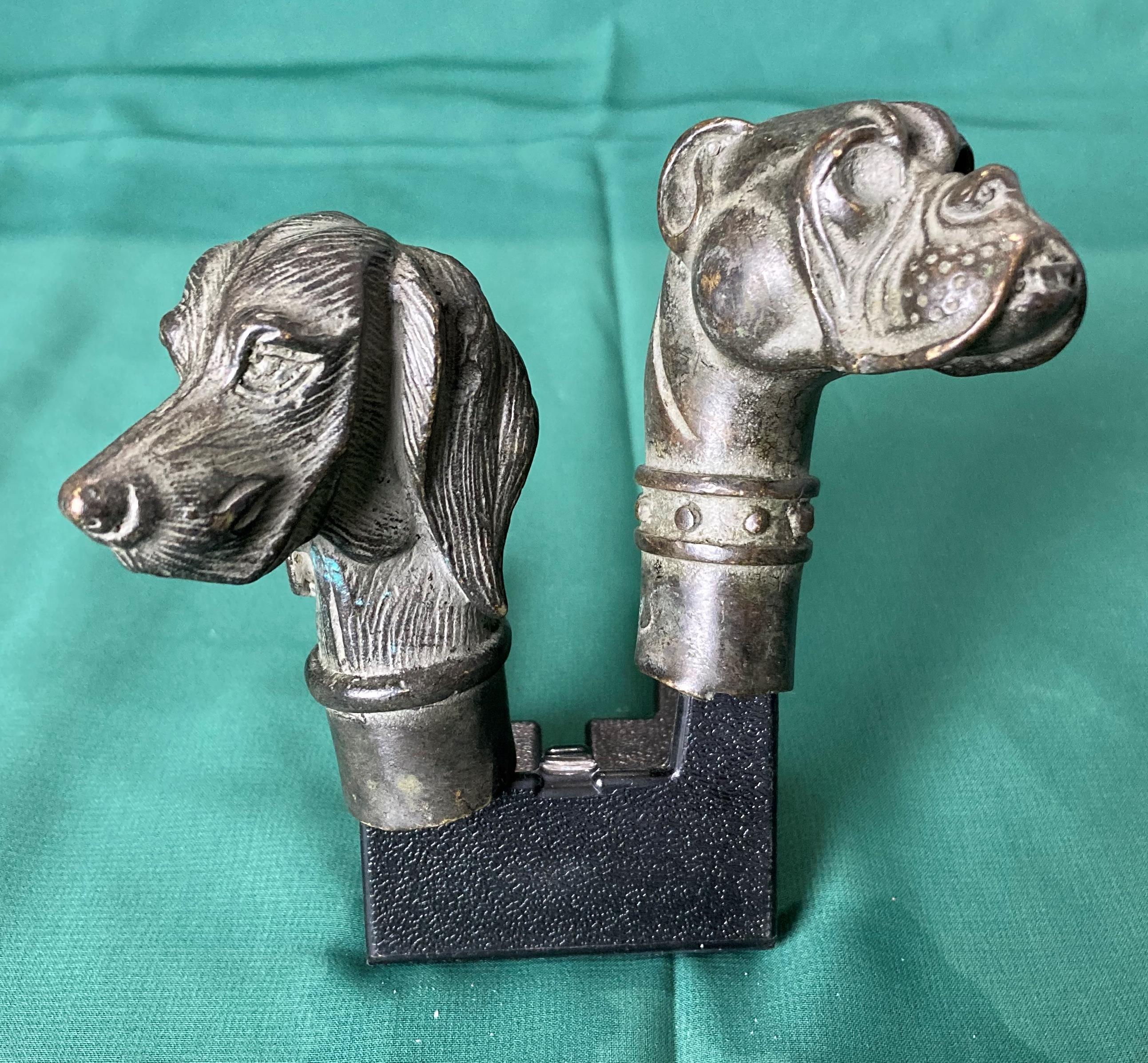 Two vintage bronze dog head walking sticks,