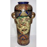A large Oriental hand-painted Satsuma vase with hunting scene and gold-coloured lugs,