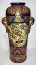 A large Oriental hand-painted Satsuma vase with hunting scene and gold-coloured lugs,