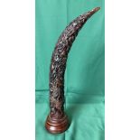 Brown resin Oriental horn/tusk on stand with dragon climbing tree (saleroom location: S1)