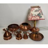 Arts & Crafts style copper and brass table lamp with flower-style collar,