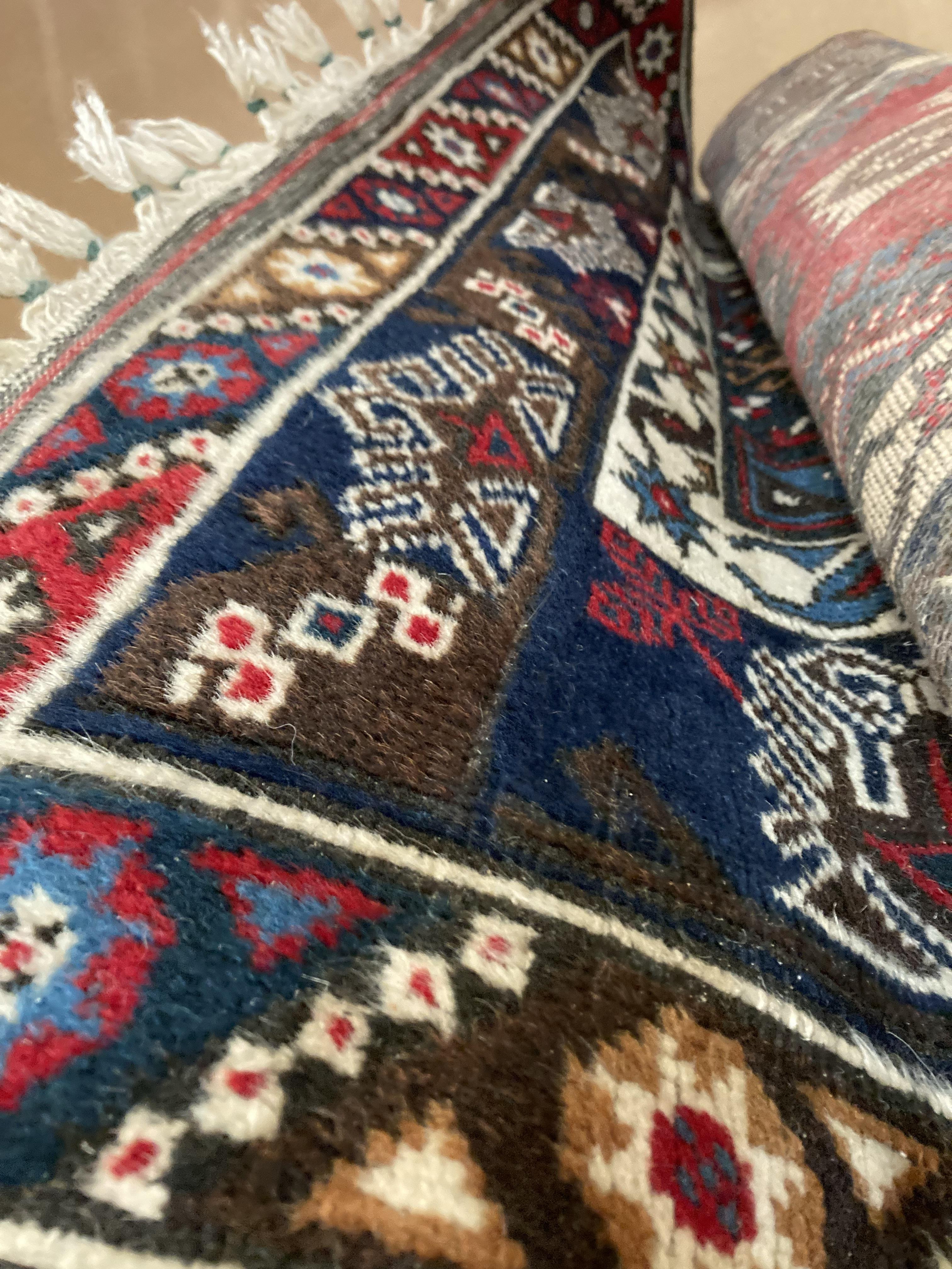A Dosemalti red and blue patterned oriental rug, - Image 4 of 4