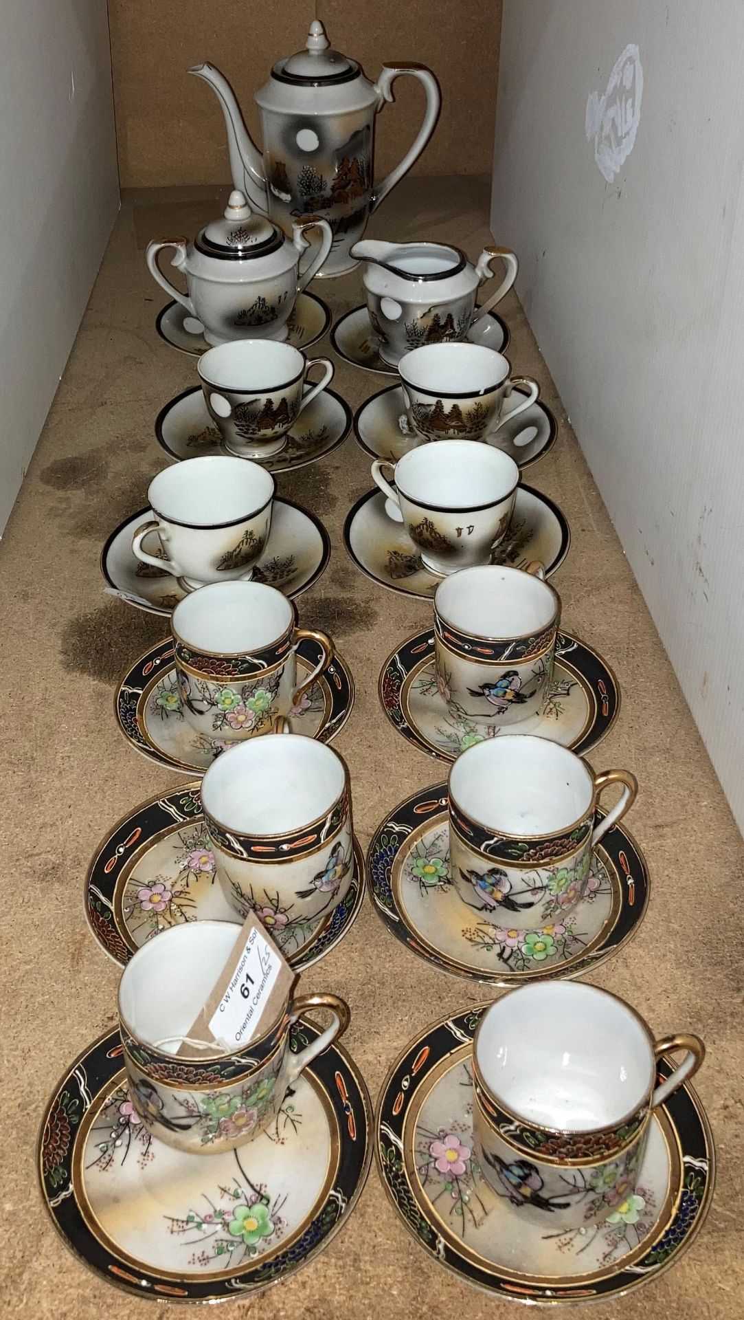 A vintage Japanese 13-piece Kutani Lithophang tea service - cups with Geisha face visible at the