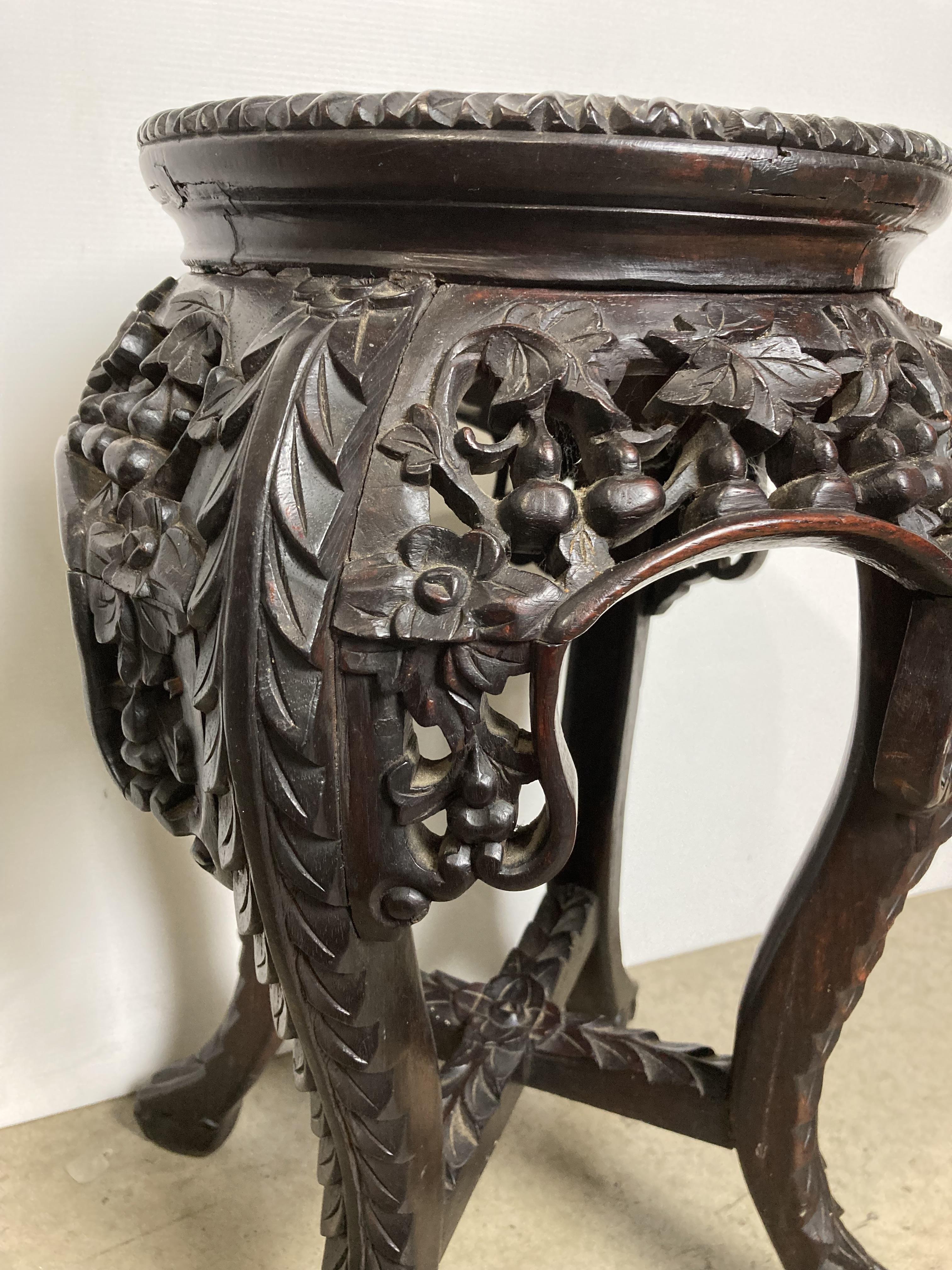 A small Oriental wooden hand-carved marble-topped plant stand/jardiniere with carved plants/flowers - Image 3 of 5