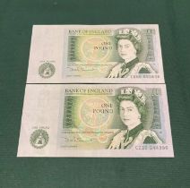 Two mint condition one pound notes,