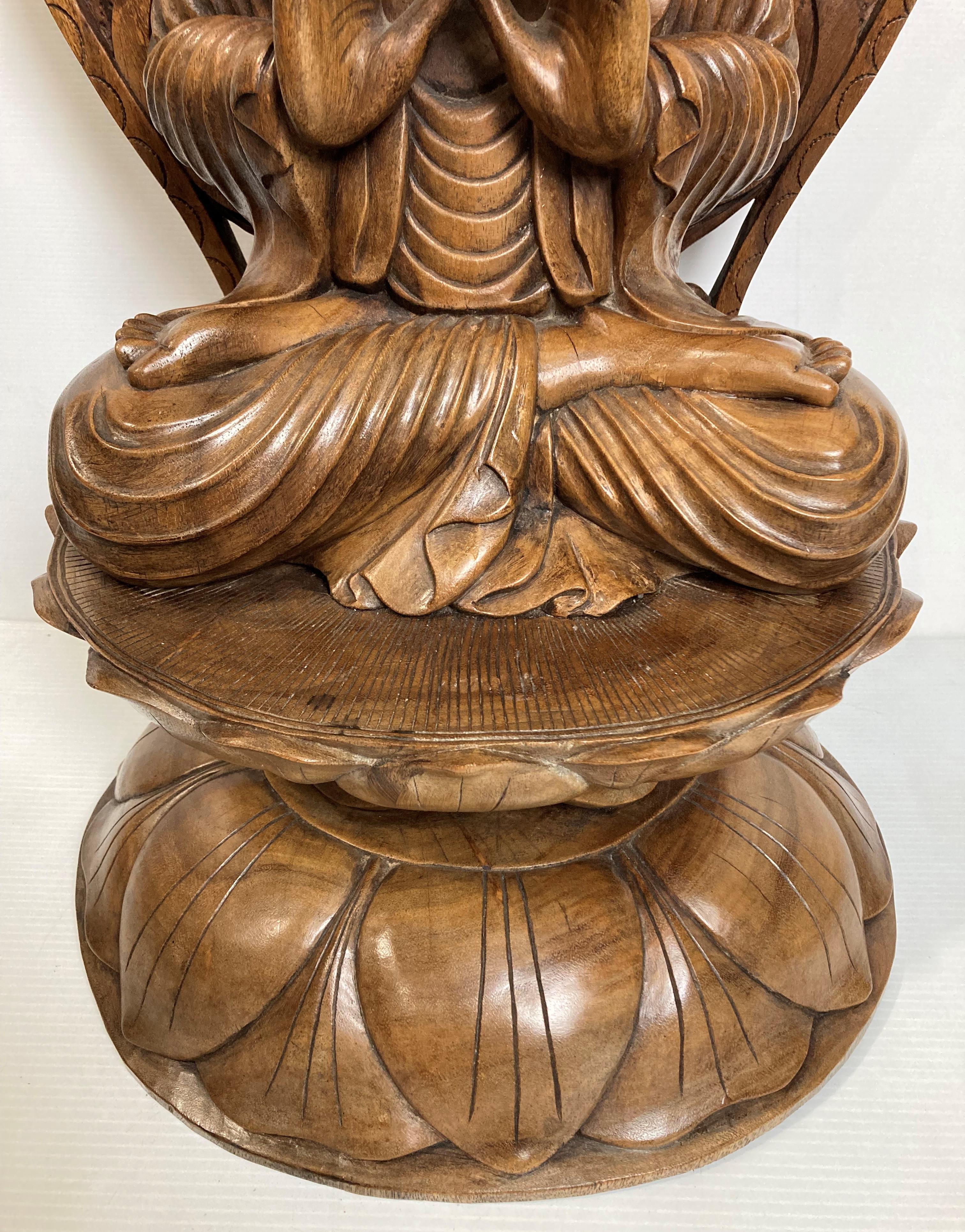 An Oriental wooden hand-carved meditating Buddha on lotus leaf - possibly Early 20th Century - 70cm - Image 3 of 5