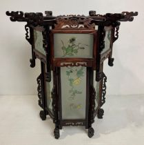 An Oriental wooden hand-carved hanging lantern shade with carved dragons and hand-painted glass