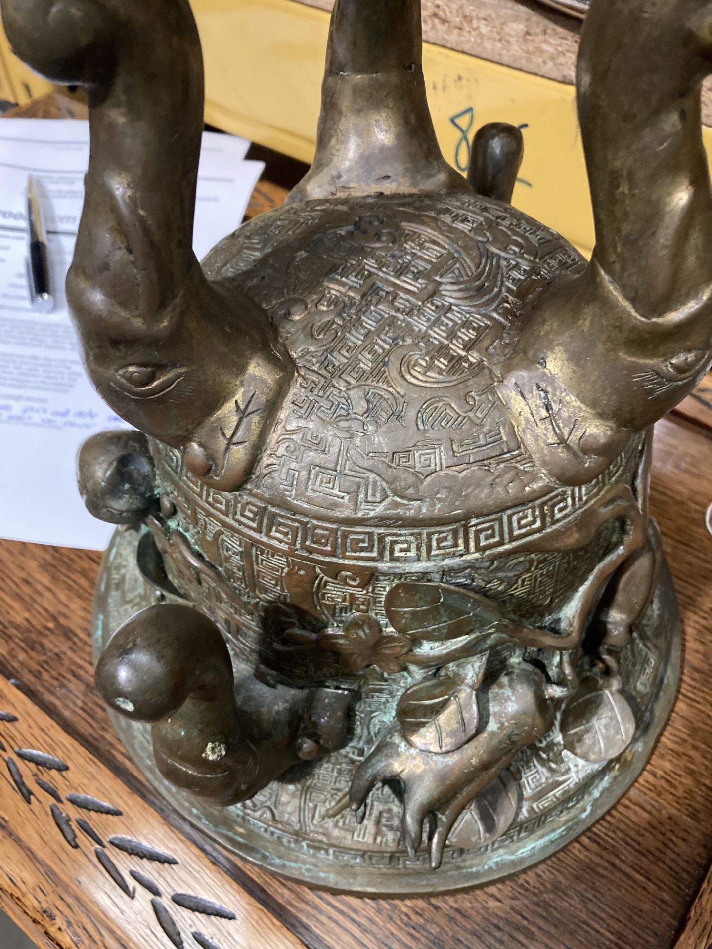 An Oriental bronze incense burner with elephant head legs and two elephant head handles with - Image 17 of 21