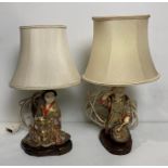 Two vintage gilt Satsuma Kutani lamps on wooden bases including Geisha lady with dog seated (no