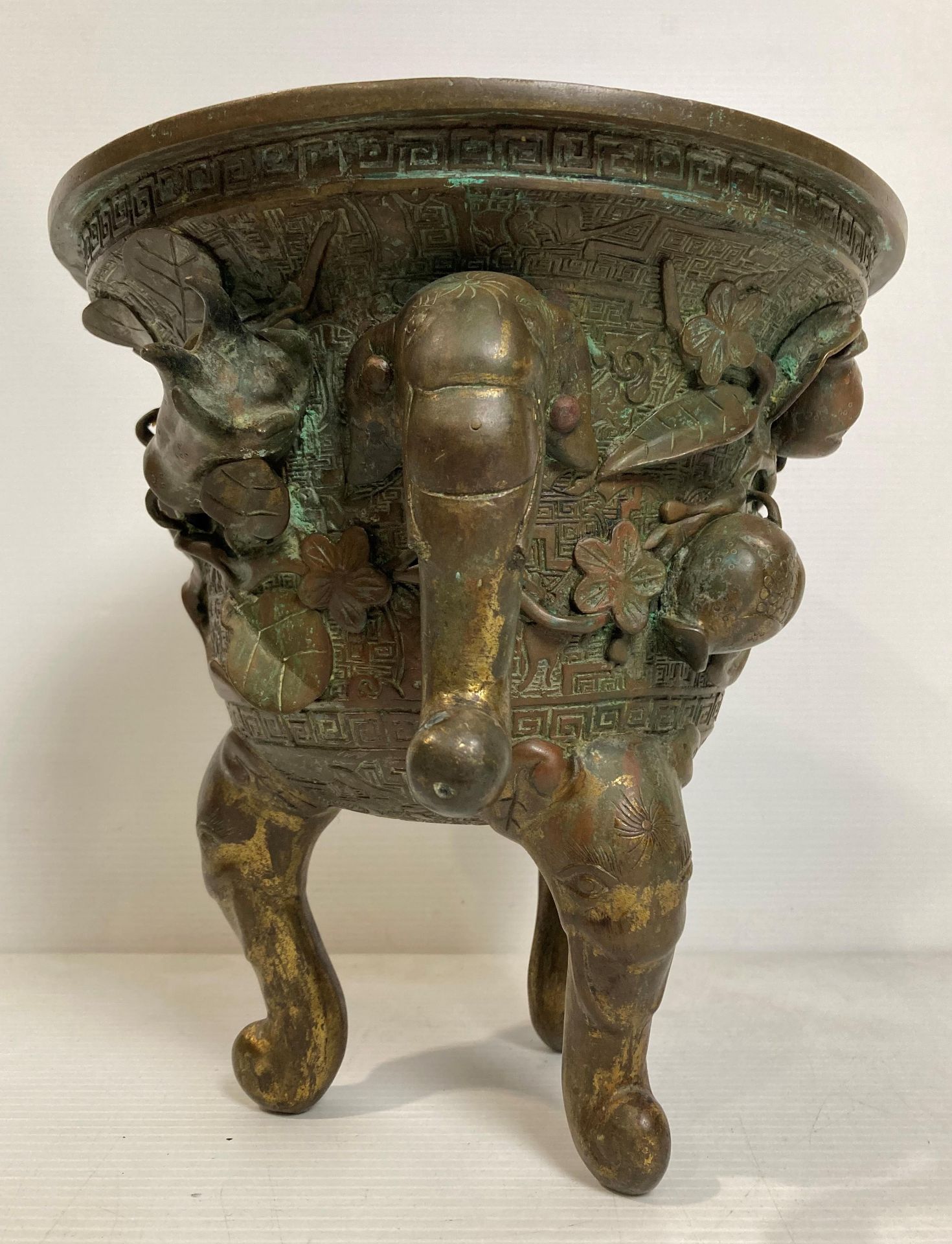 An Oriental bronze incense burner with elephant head legs and two elephant head handles with - Image 5 of 21