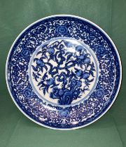 An antique 'Yongzheng' reign blue and white Oriental bowl with fig tree design and six symbol mark