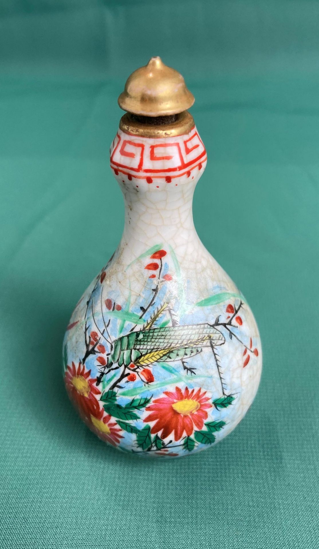 Antique Chinese scent/snuff bottle hand-painted with flower and locust/grass hopper with stopper