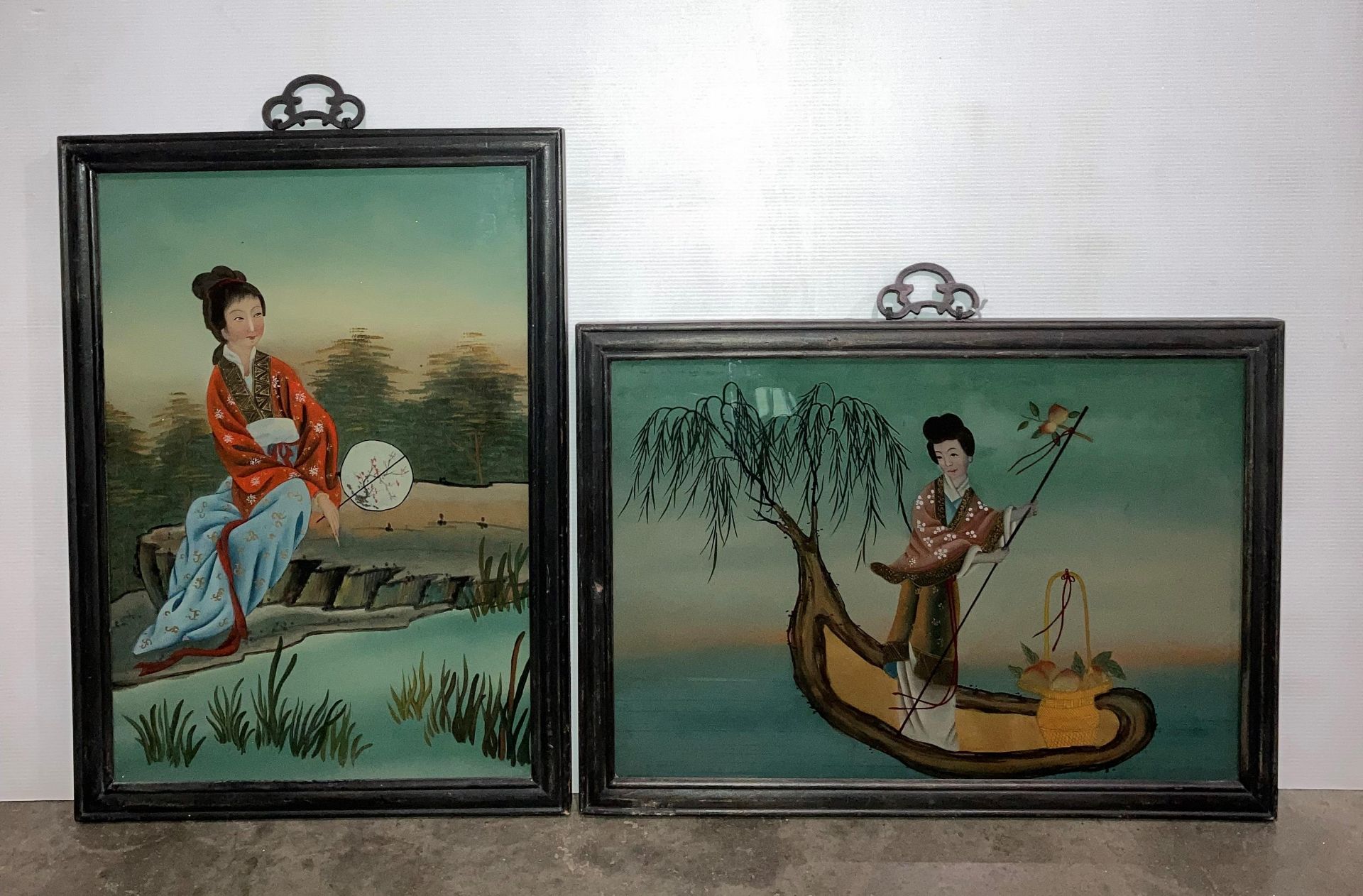 Two vintage Oriental reverse painting on glass of Geisha ladies both with brass/bronze hanging