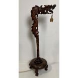 A wooden Oriental dragon hand-carved table lamp (no test, illegal flex cut off - no shade),