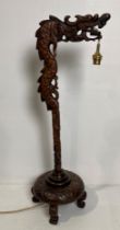 A wooden Oriental dragon hand-carved table lamp (no test, illegal flex cut off - no shade),