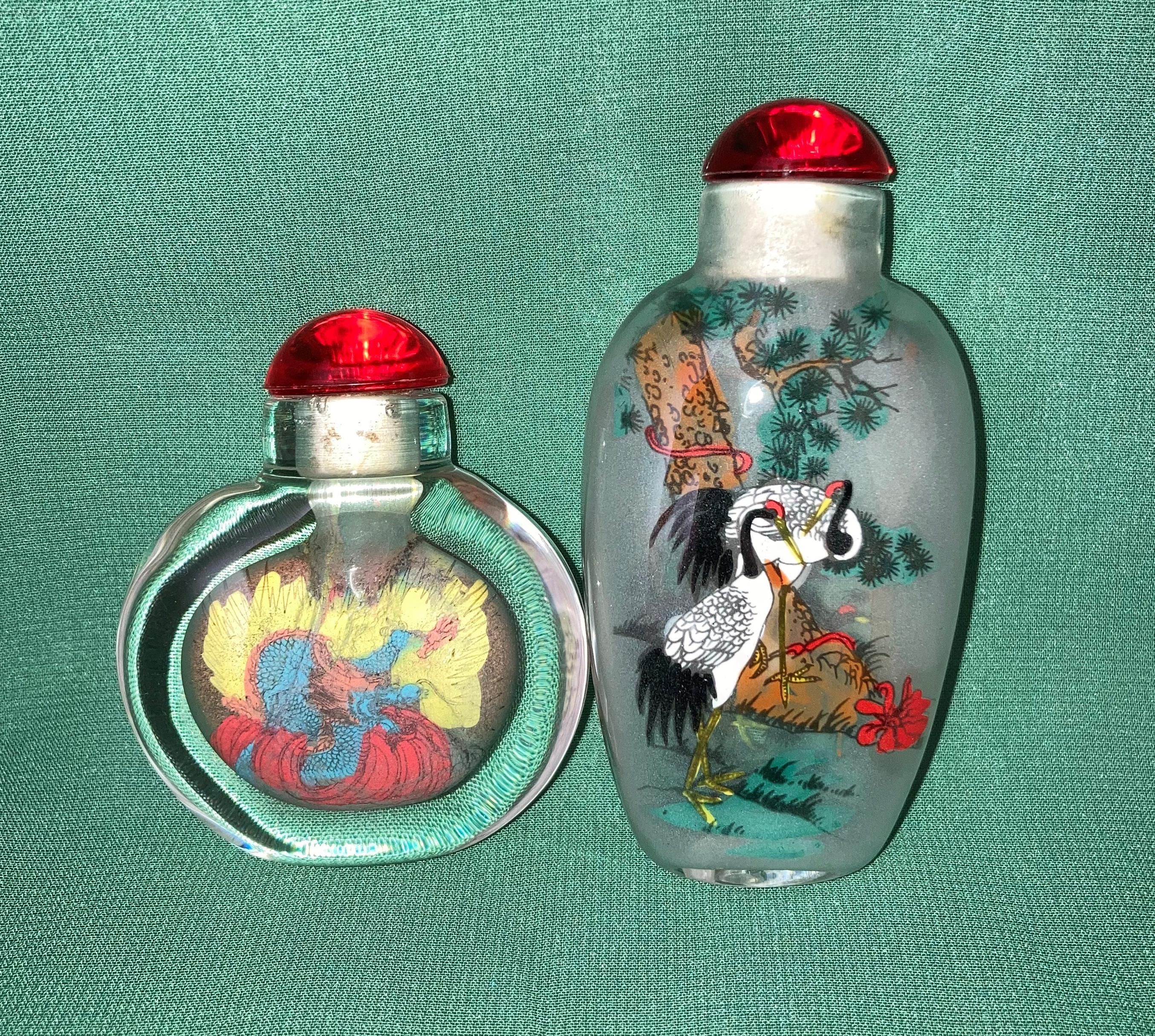 Two assorted glass snuff bottles,