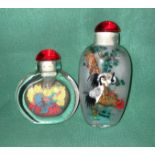 Two assorted glass snuff bottles,