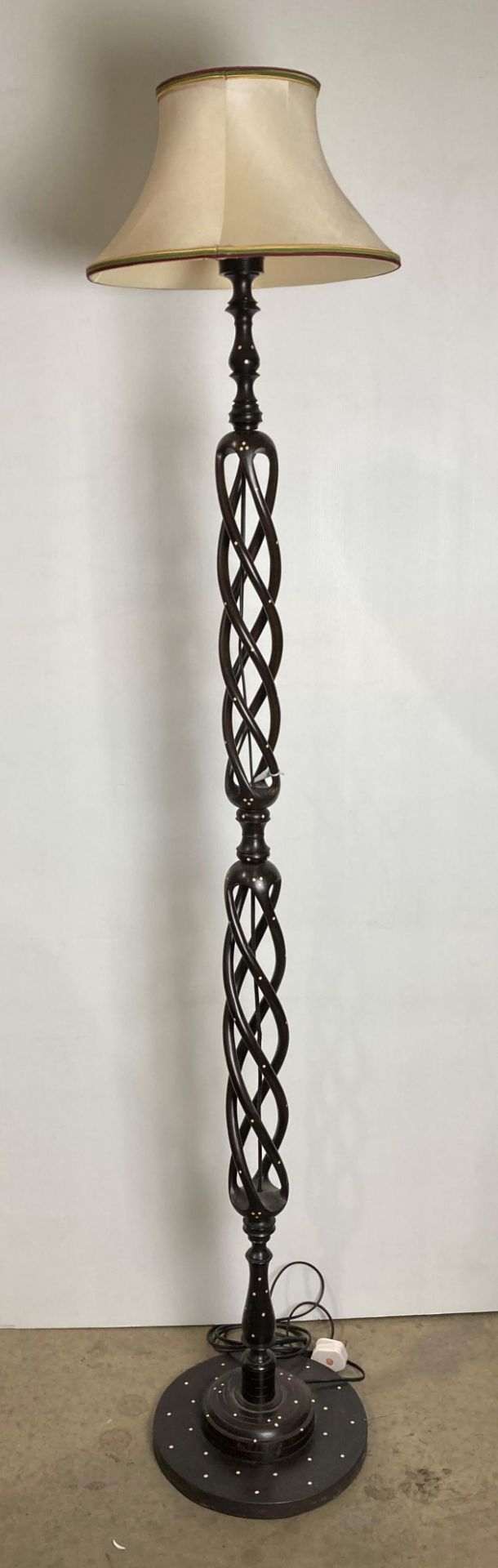 Beautiful ebony wooden turned standard lamp with four-stem twisted column inlaid with white spots