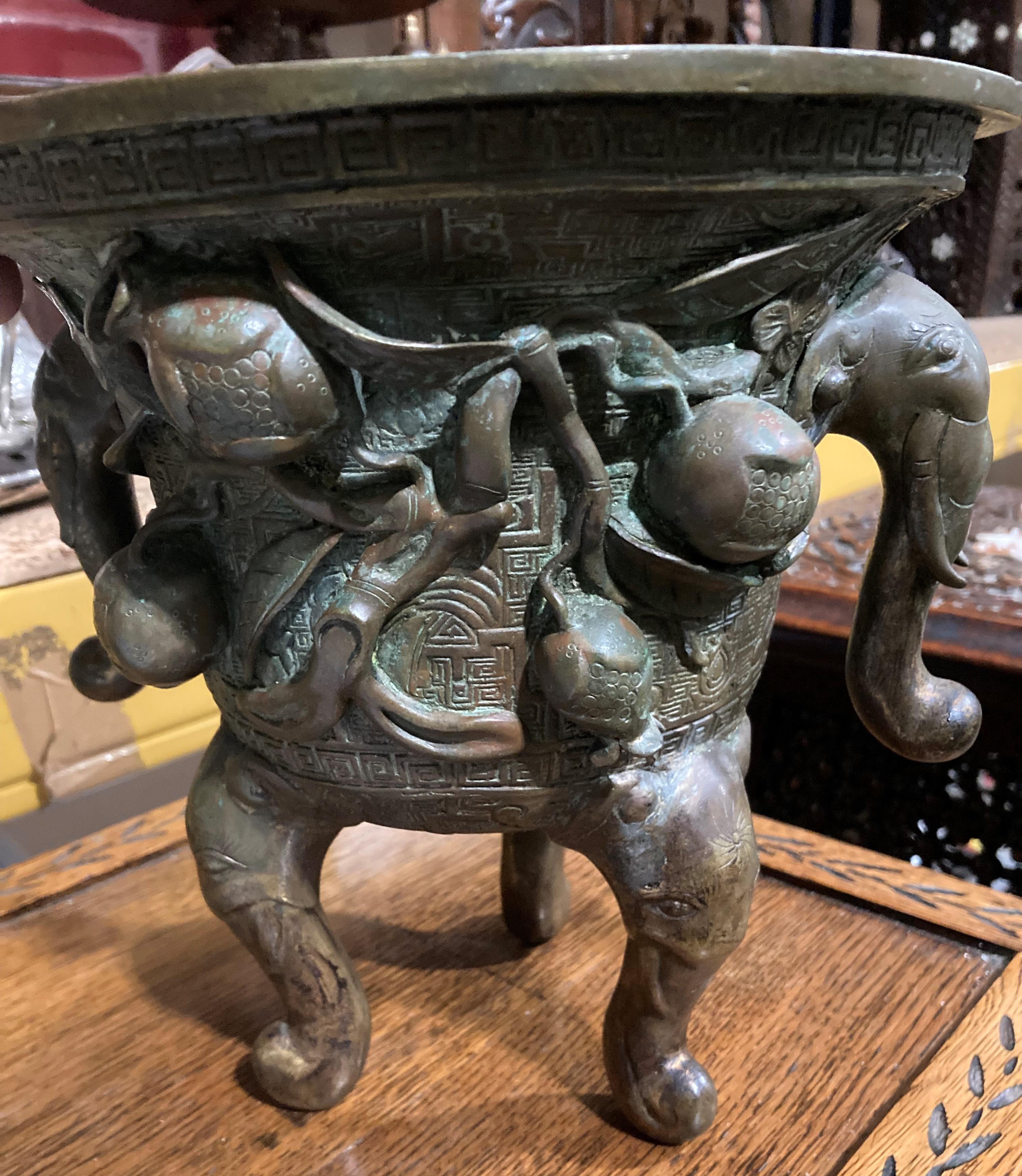 An Oriental bronze incense burner with elephant head legs and two elephant head handles with - Image 12 of 21