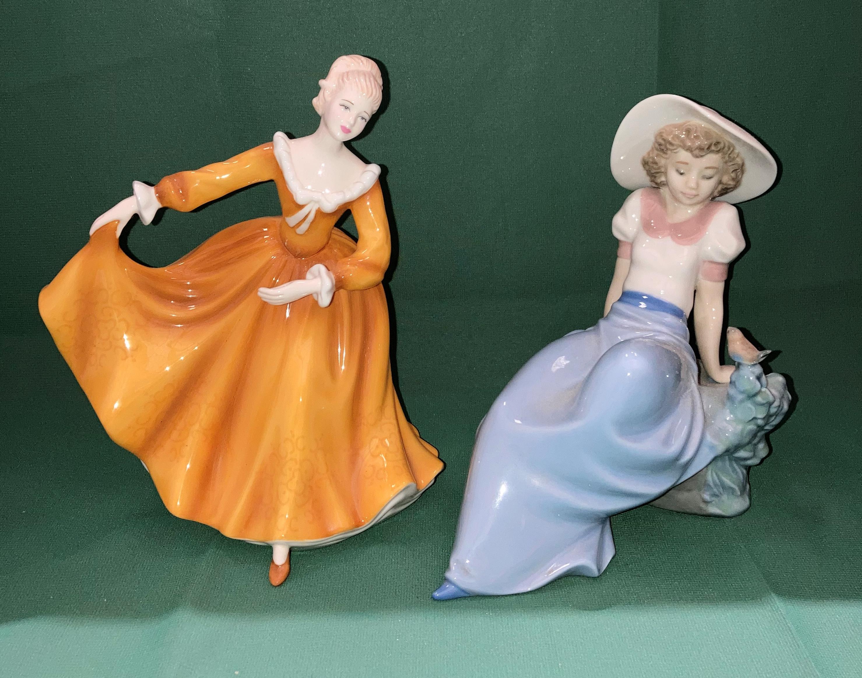 A Royal Doulton Pretty Ladies Best of the Classics 'Kirsty' ceramic figurine and a Nao Yong girl