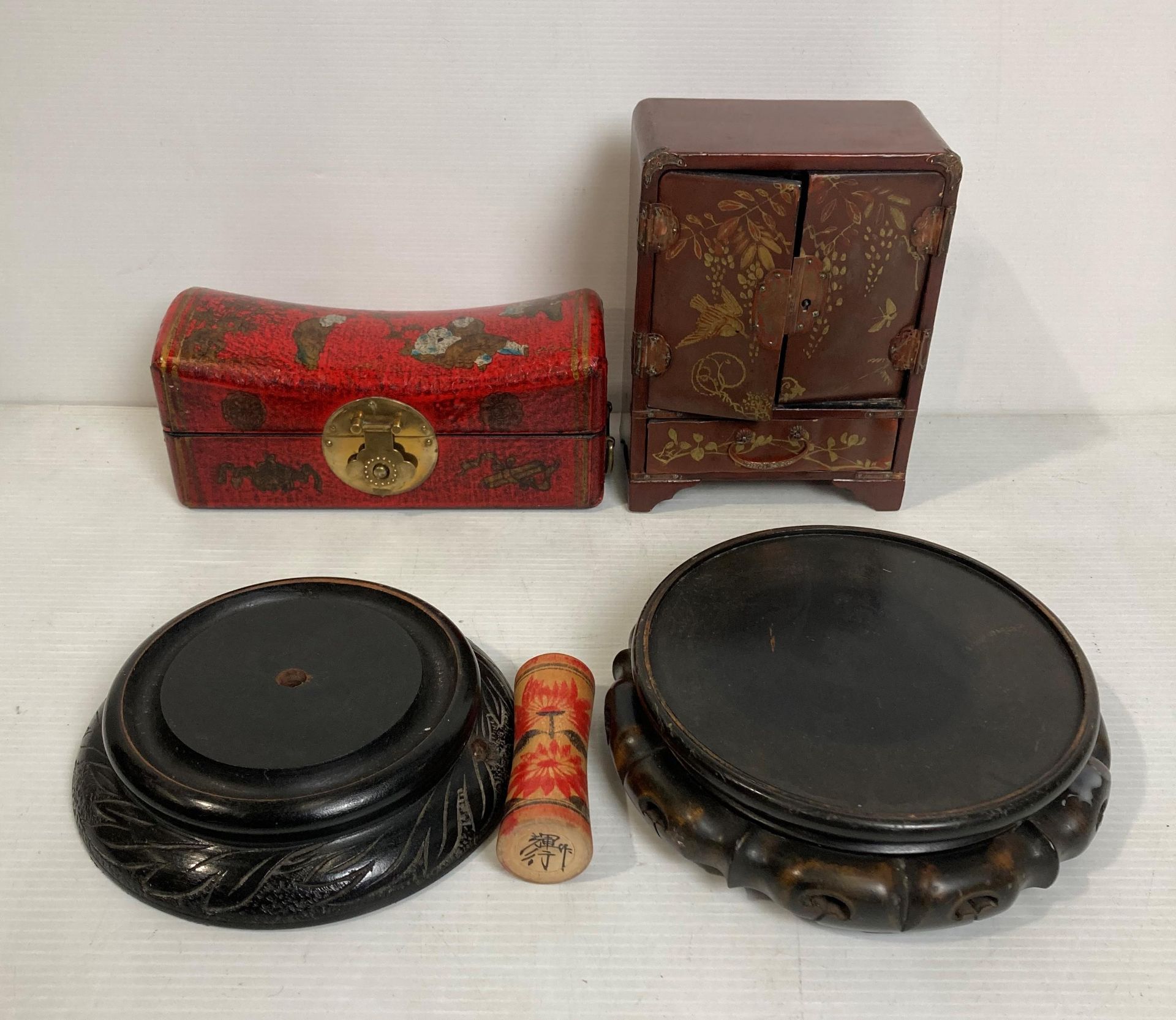 Two assorted Oriental boxes and two wooden circular stands (saleroom location: S2 QB14)