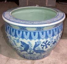 An antique Chinese blue and white cache pot with three fish and stamp to base, 25cm diameter x 17.