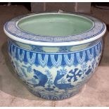 An antique Chinese blue and white cache pot with three fish and stamp to base, 25cm diameter x 17.