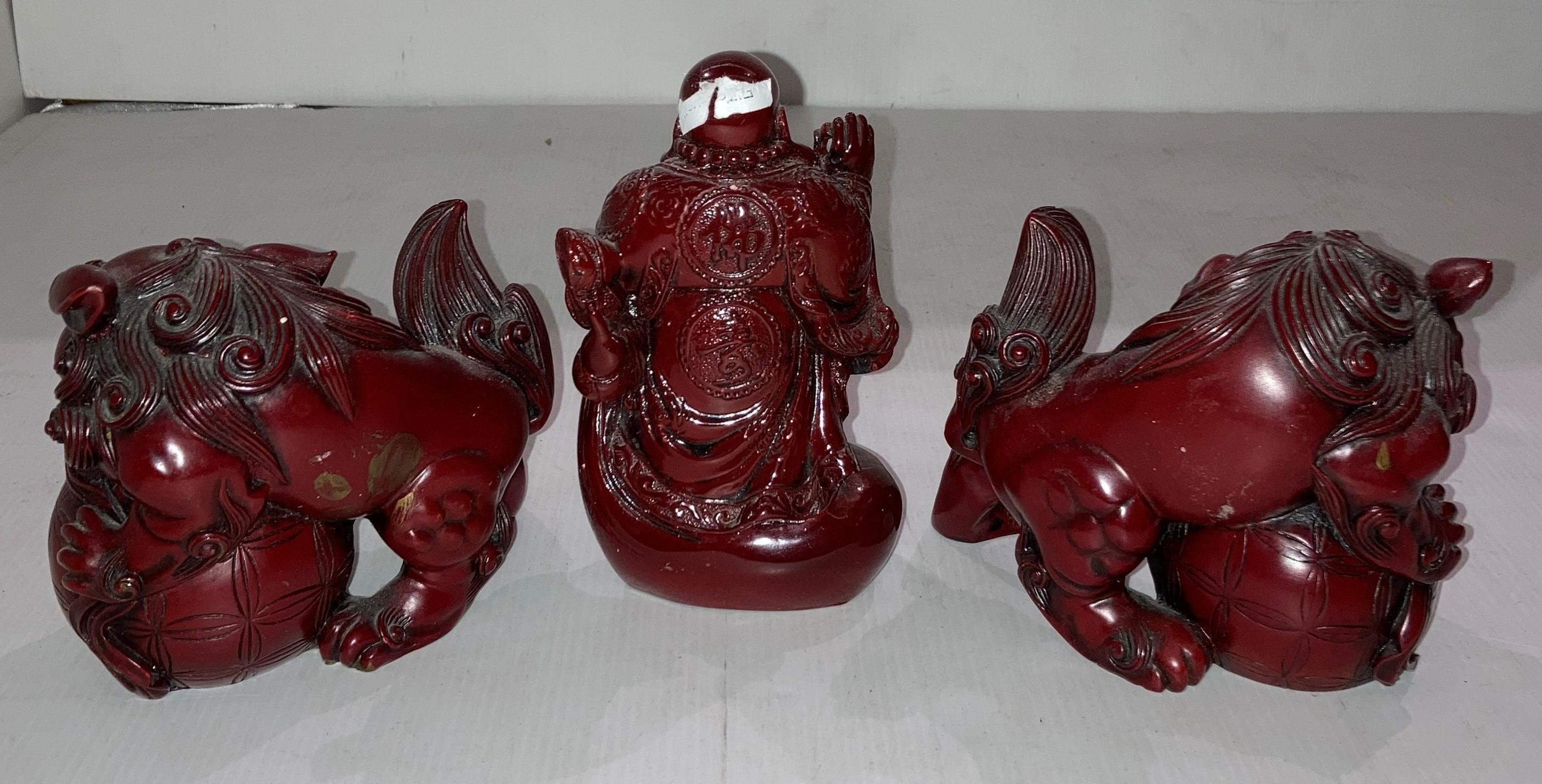 A pair of Mid Century Chinese red resin Foo dog figurines (14cm x 11cm high) and a red resin - Image 2 of 2