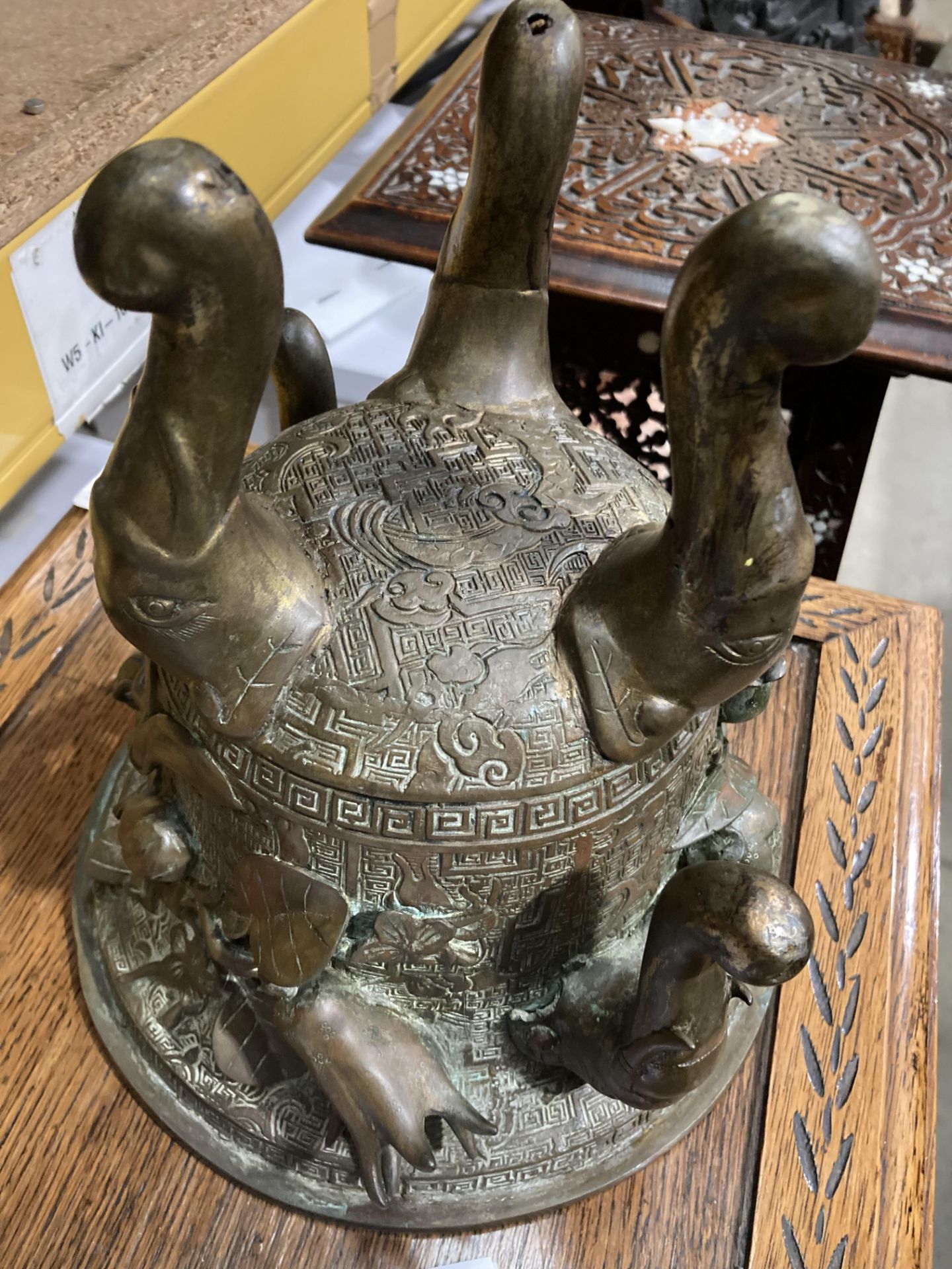 An Oriental bronze incense burner with elephant head legs and two elephant head handles with - Image 15 of 21