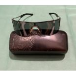 Pair of black Versace sunglasses,