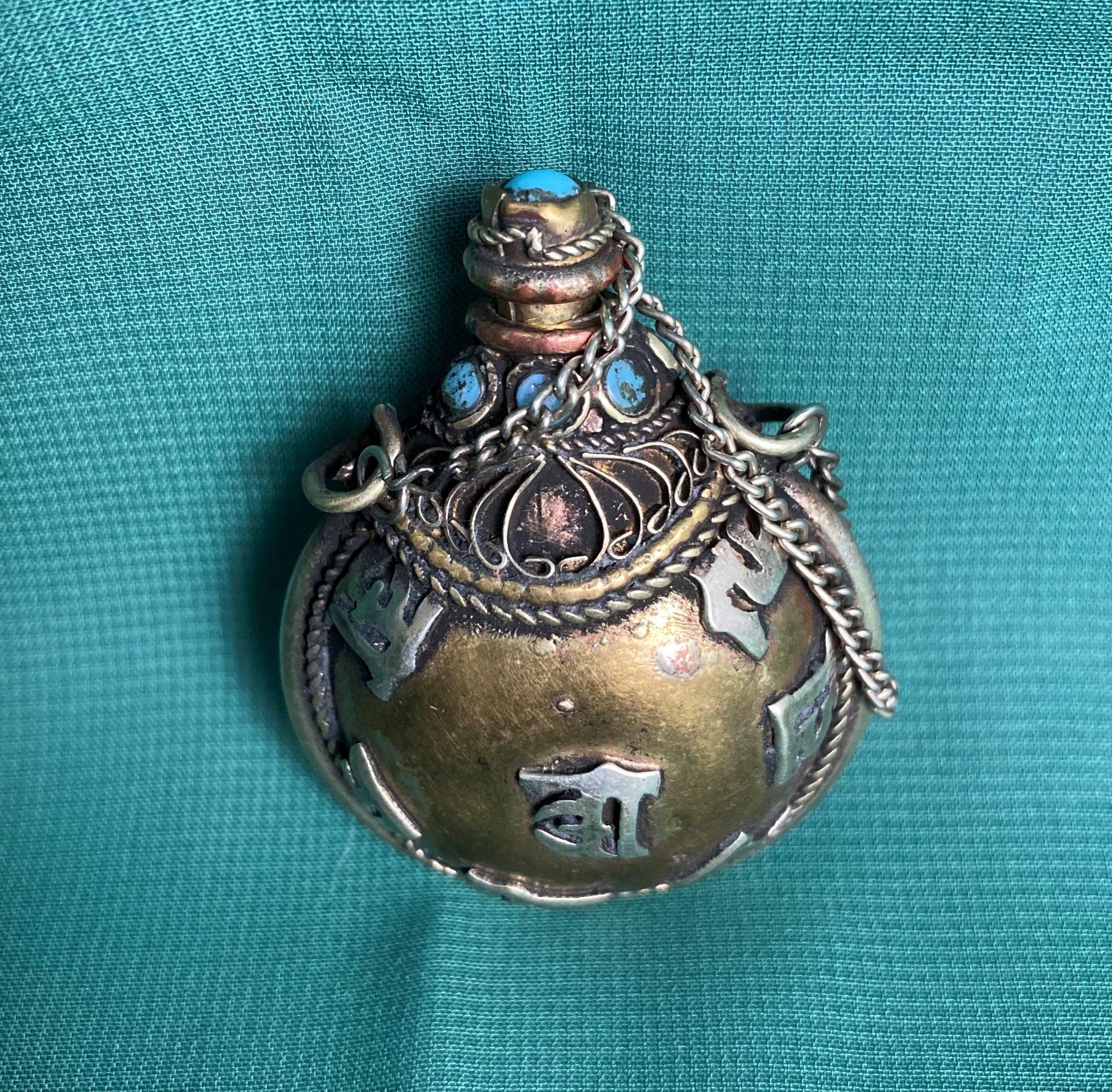 An antique Chinese/Tibetan hand-made metal snuff/opium bottle with light blue stones, - Image 2 of 4