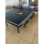 Nissan fold away table tennis table complete with two bats and four balls