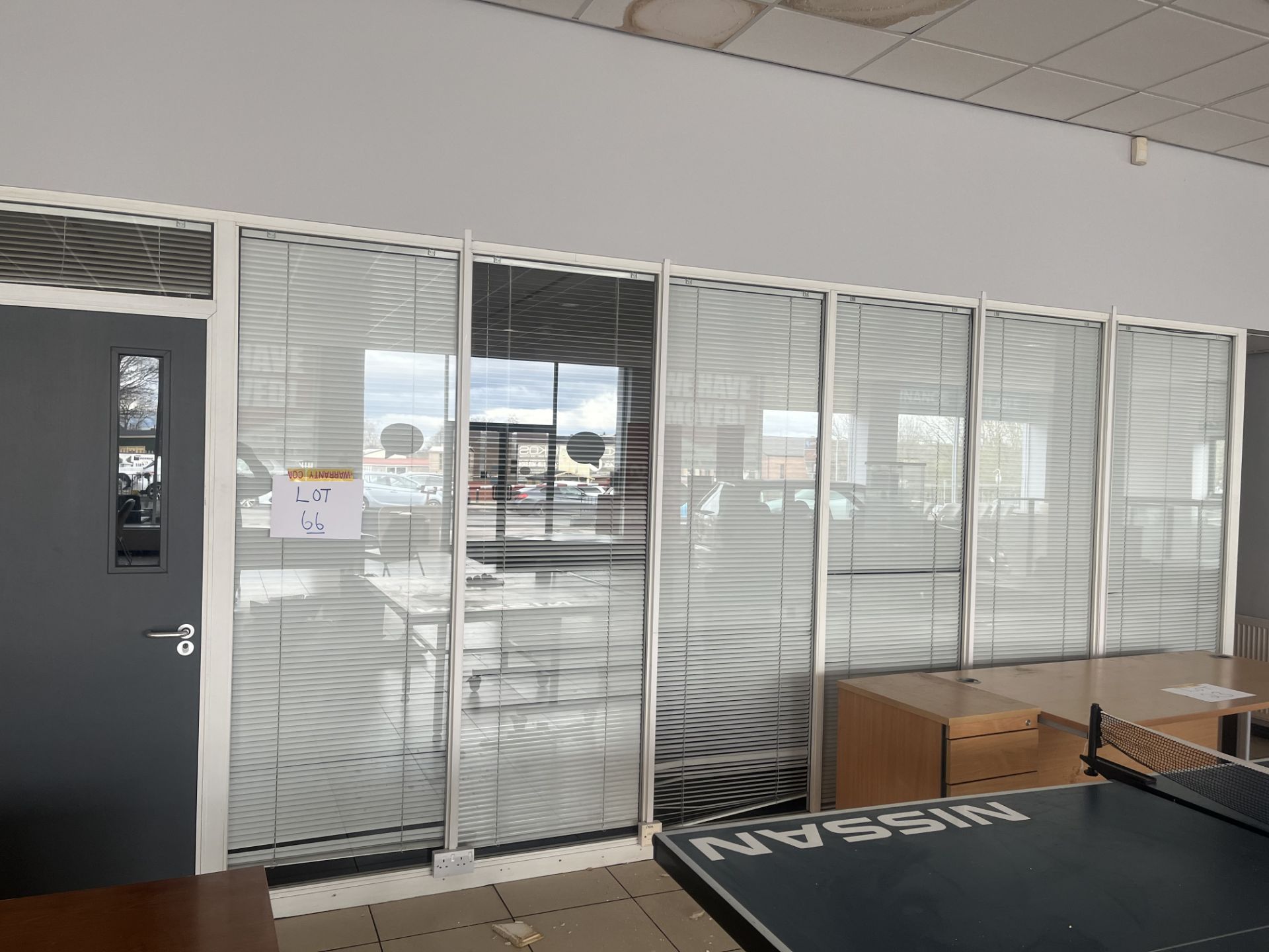 Glass partition section comprising six panels and two doors (Please note the successful bidder is