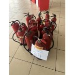 Sixteen assorted fire extinguishers including foam, CO2 and water,