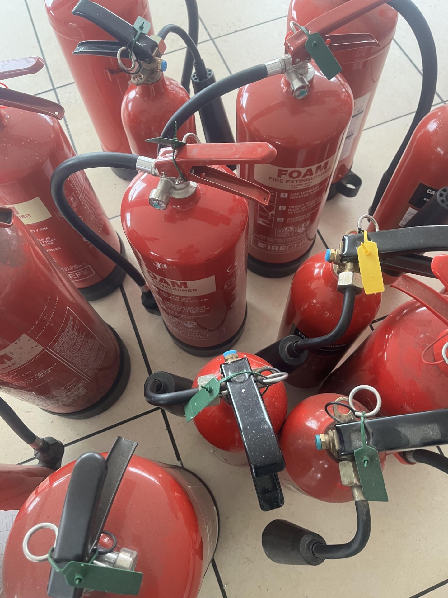 Sixteen assorted fire extinguishers including foam, CO2 and water, - Image 2 of 4