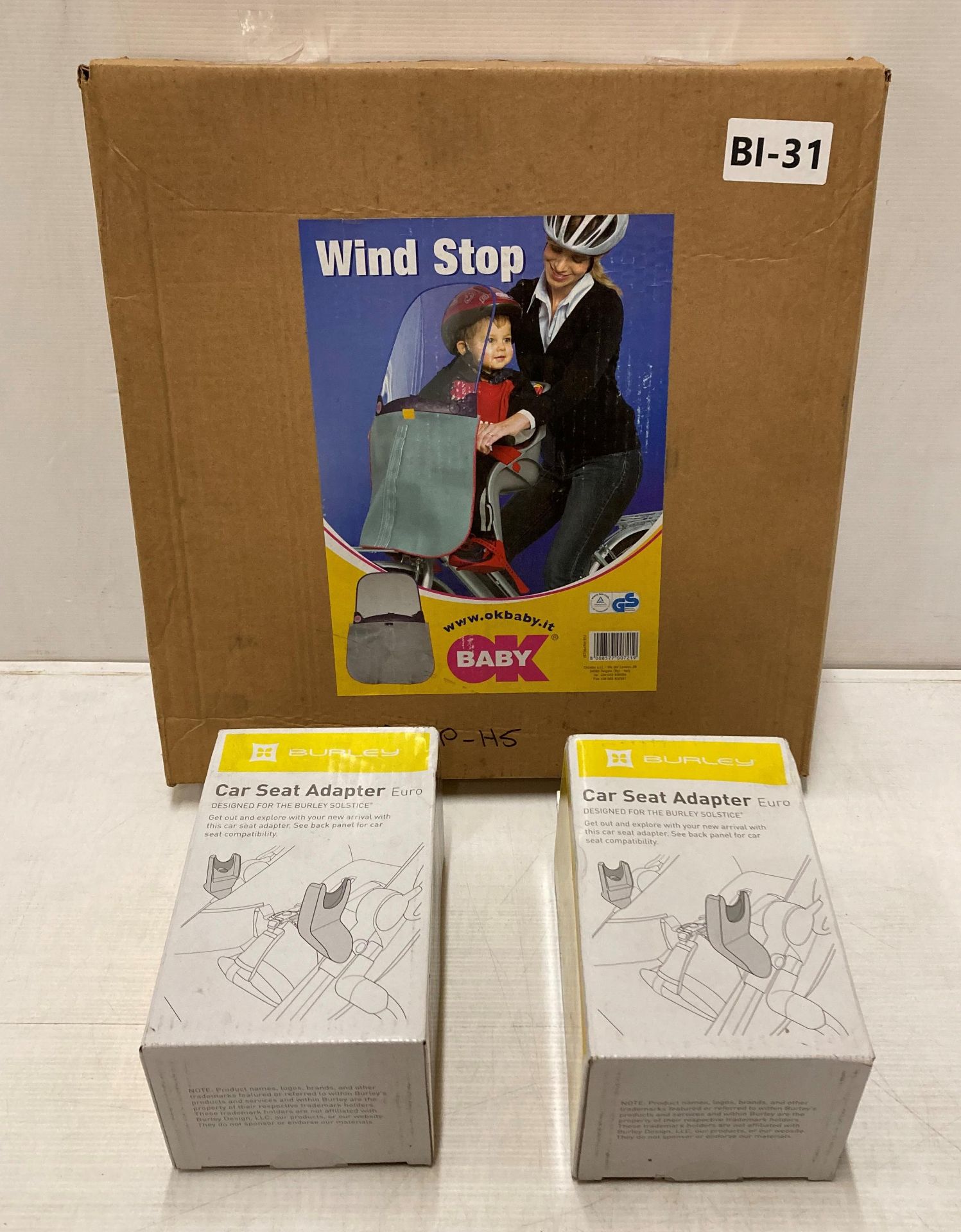 OK Baby Wind-Stop protector and 2 x Burley car seat adaptors (saleroom location: L07)