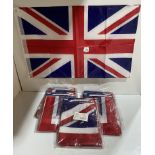 7 x packs of 12 large union jack flags with 2 brass eyelets (saleroom location: G12)