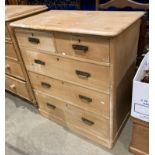 A pine five-drawer (two short, three long) chest of drawers,