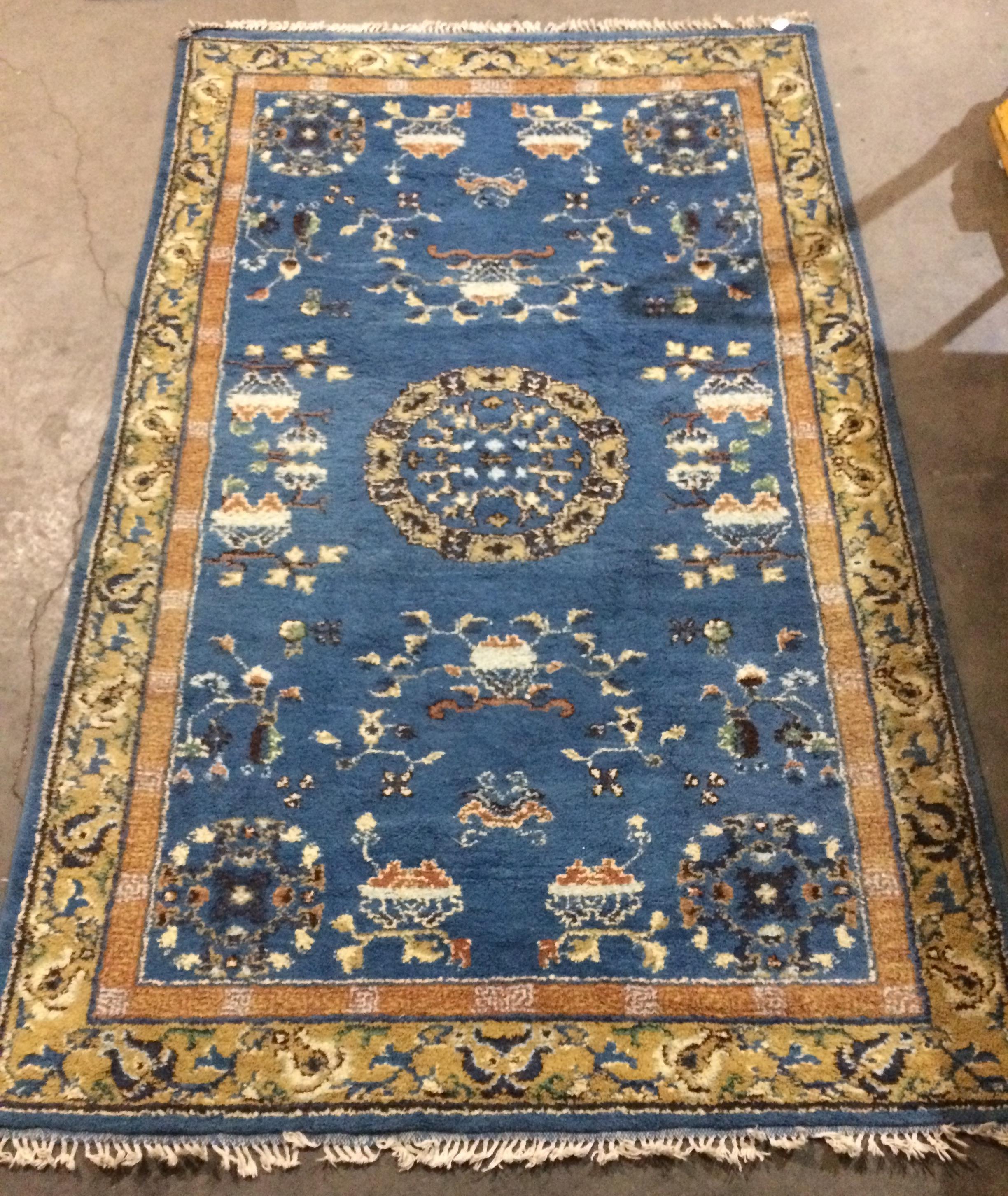 Blue Oriental-style rug,