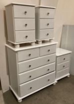 A white painted pine chest of drawers - three long,