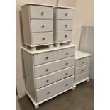 A white painted pine chest of drawers - three long,