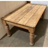 Solid stripped pine farmhouse kitchen table with thick turned legs,