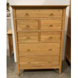 Willis & Gambier oak chest of drawers, four short and three long,